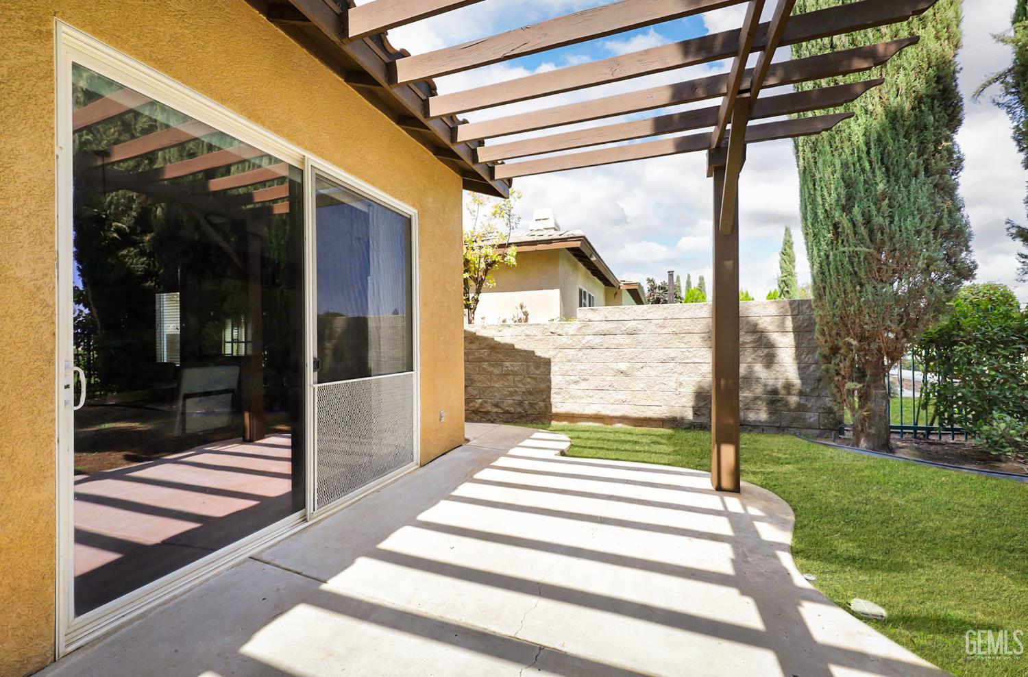 Undisclosed Address Bakersfield, CA 93312 - Photo 32 of 44 a front view of a house with a yard