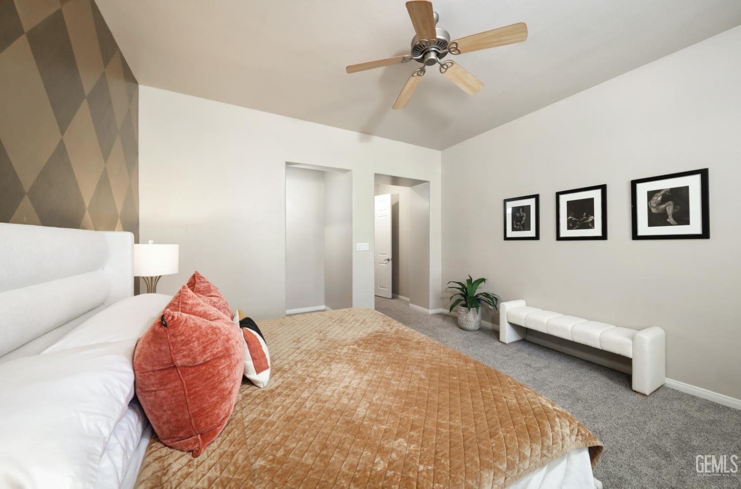 Undisclosed Address Bakersfield, CA 93312 - Photo 33 of 44 a bed room with a bed and a couch