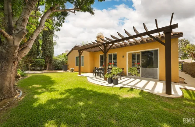 a view of a backyard with a garden