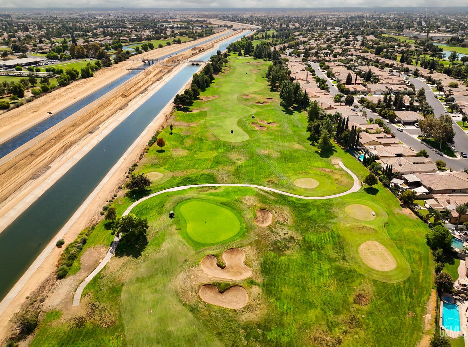 Undisclosed Address Bakersfield, CA 93312 - Photo 42 of 44 an aerial view of swimming pool a yard and mountain view in back