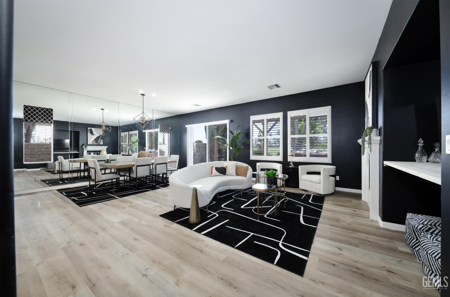 Undisclosed Address Bakersfield, CA 93312 - Photo 5 of 44 a living room with furniture and a flat screen tv