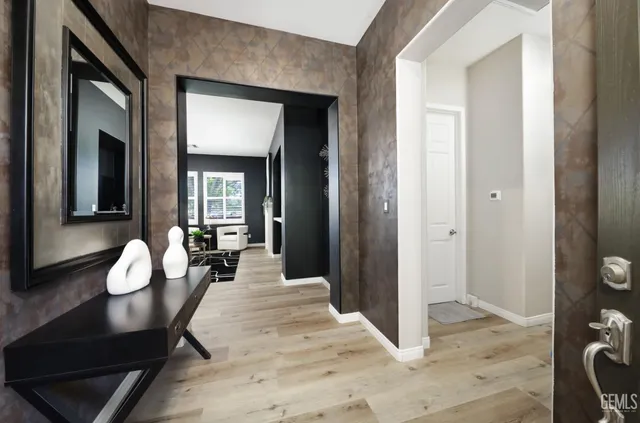 a view of a livingroom with furniture and a dining room