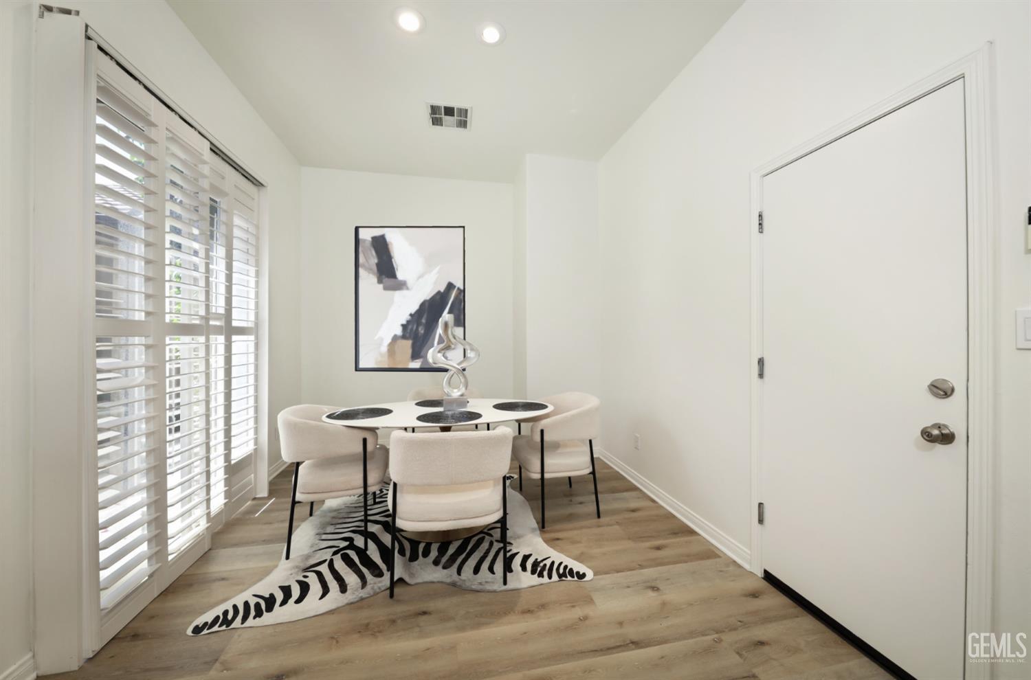 Undisclosed Address Bakersfield, CA 93312 - Photo 8 of 44 a dining room with furniture and window