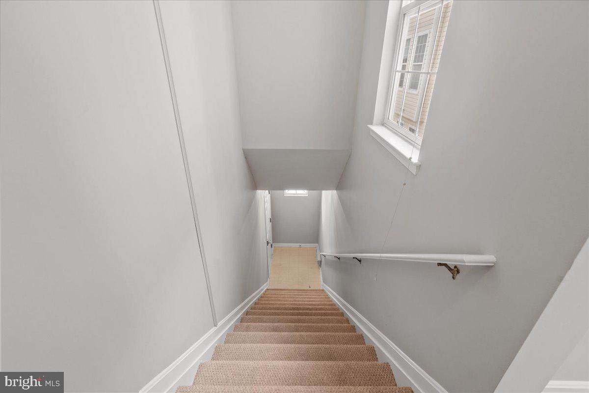 12713 Found Stone Road, Unit 5G5 Germantown, MD 20876 - Photo 18 of 42 Rear stairway to private garage.