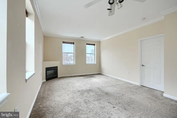 an empty room with windows