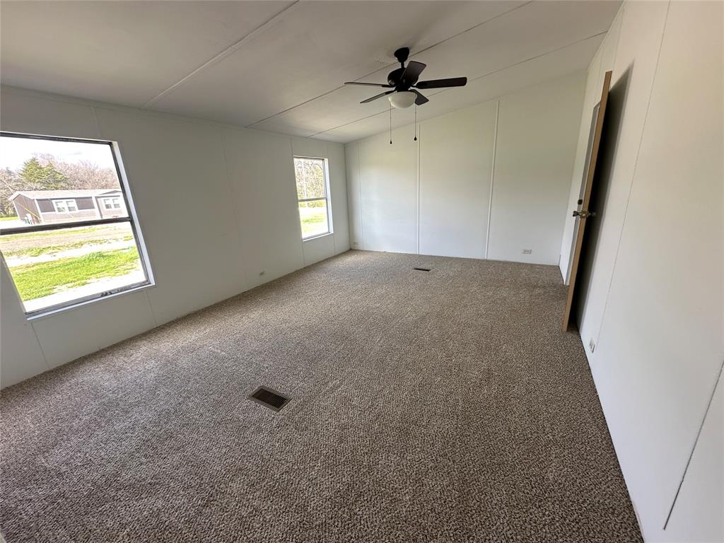 230 Largo Street Bonham, TX 75418 - Photo 26 of 34 a view of an empty room and a window