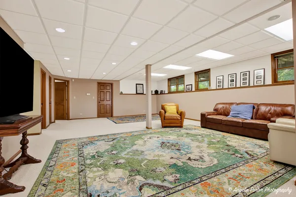 a view of deck with table and chairs and wooden floor