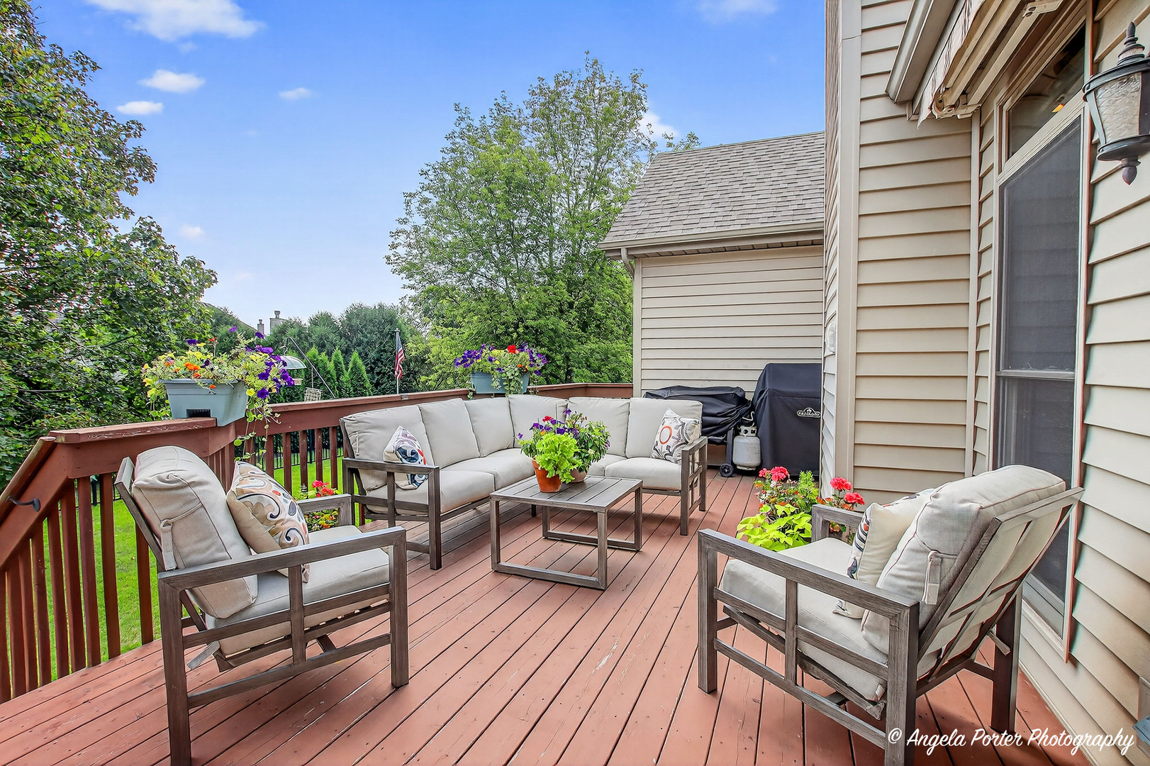 10910 Partridge Trail Richmond, IL 60071 - Photo 44 of 62 a view of deck with table and chairs and wooden floor