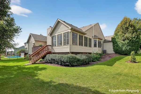a view of a car parked on the side of a street