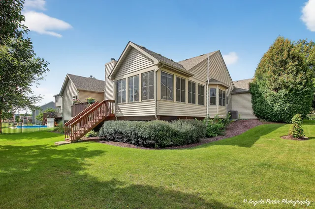 a view of a car parked on the side of a street