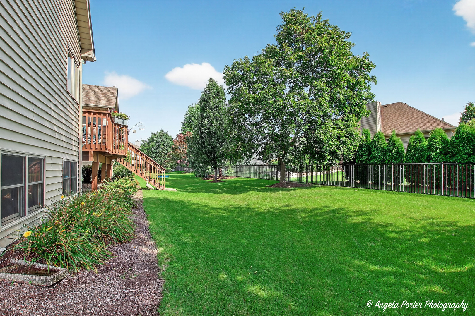 10910 Partridge Trail Richmond, IL 60071 - Photo 50 of 62 a view of a house with a backyard