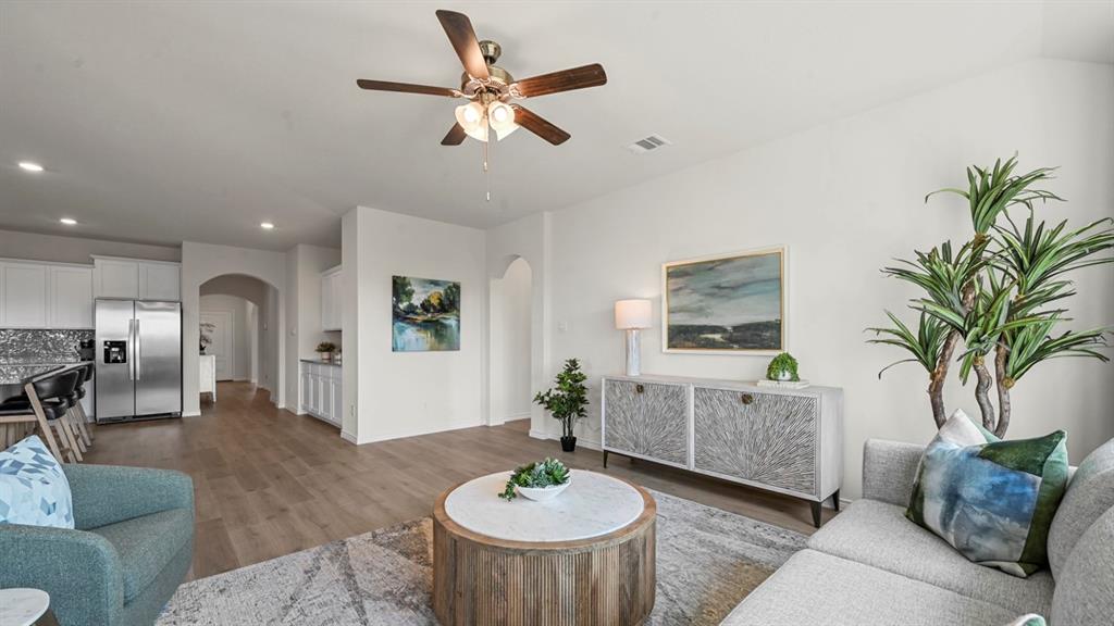 4020 Red Blf Street Pilot Point, TX 76258 - Photo 34 of 39 a living room with furniture and a dining room