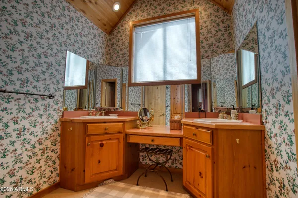 a picture of a bathroom with a shower