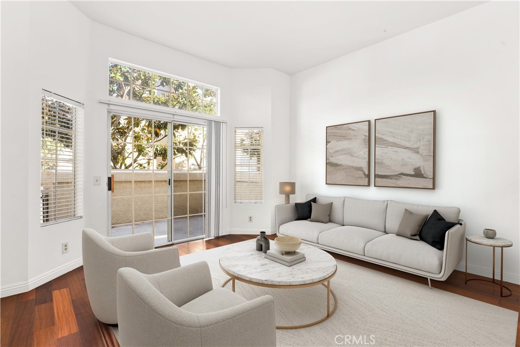 2300 Maple Avenue, Unit 26 Torrance, CA 90503 - Photo 1 of 30 a living room with furniture and a large window