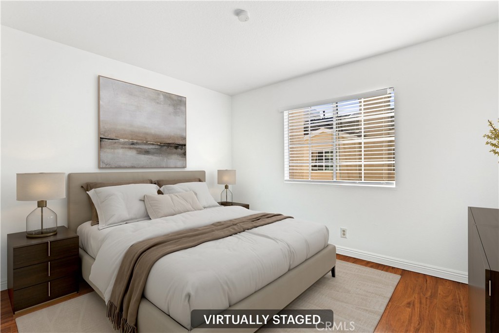 2300 Maple Avenue, Unit 26 Torrance, CA 90503 - Photo 21 of 24 a bedroom with a bed and a window