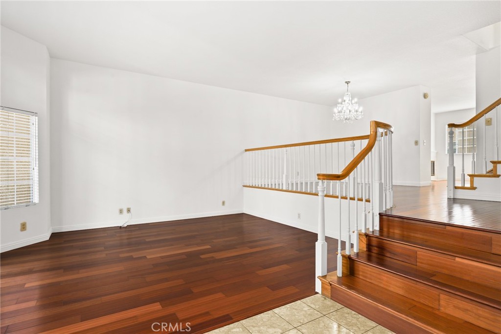 2300 Maple Avenue, Unit 26 Torrance, CA 90503 - Photo 4 of 30 a view of entryway and hall with wooden floor