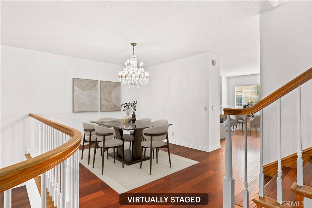 2300 Maple Avenue, Unit 26 Torrance, CA 90503 - Photo 10 of 24 a view of a dining room with furniture and chandelier
