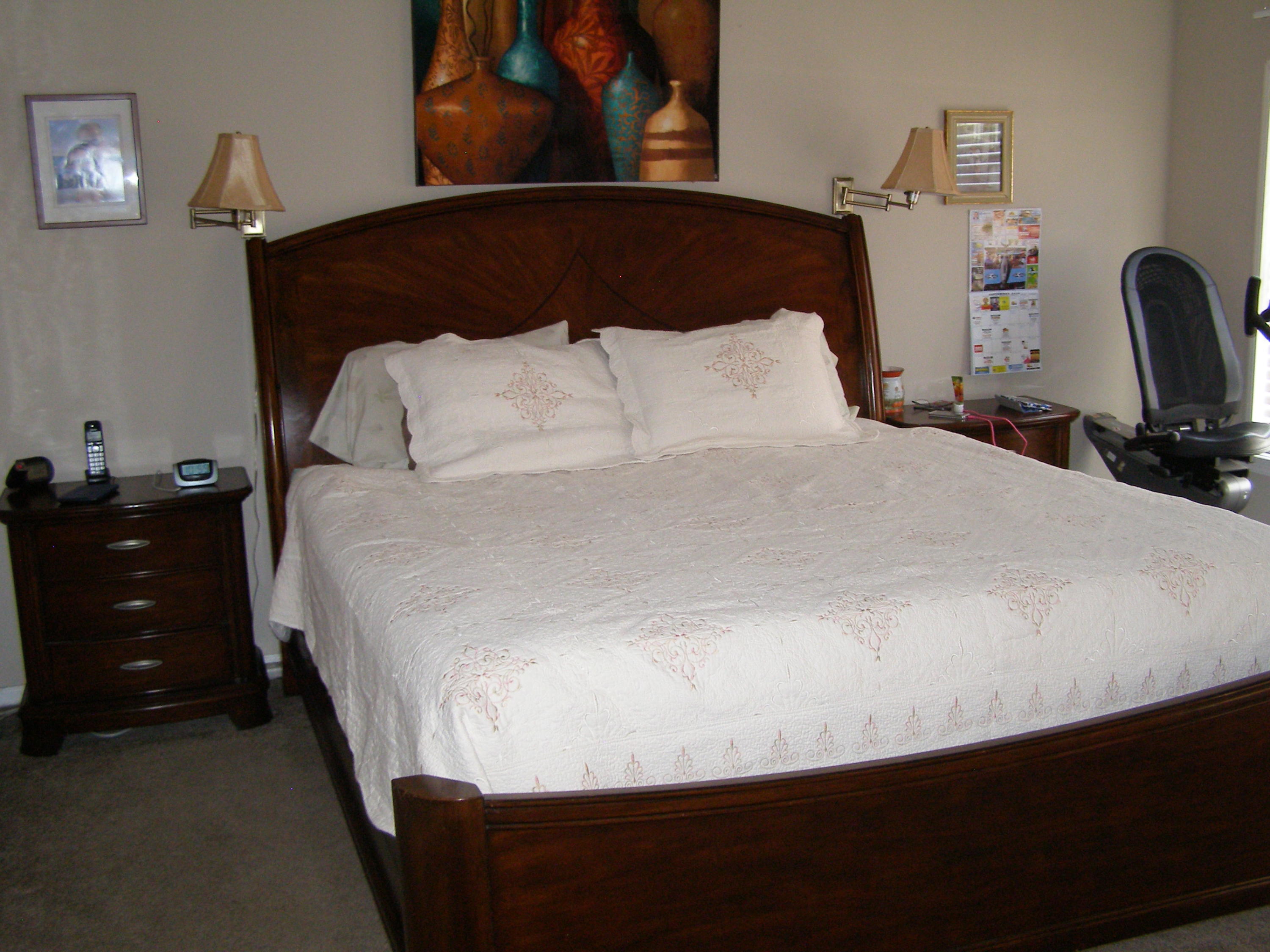 1121 State Line Road Baker, FL 32531 - Photo 15 of 25 a bedroom with a bed and a desk