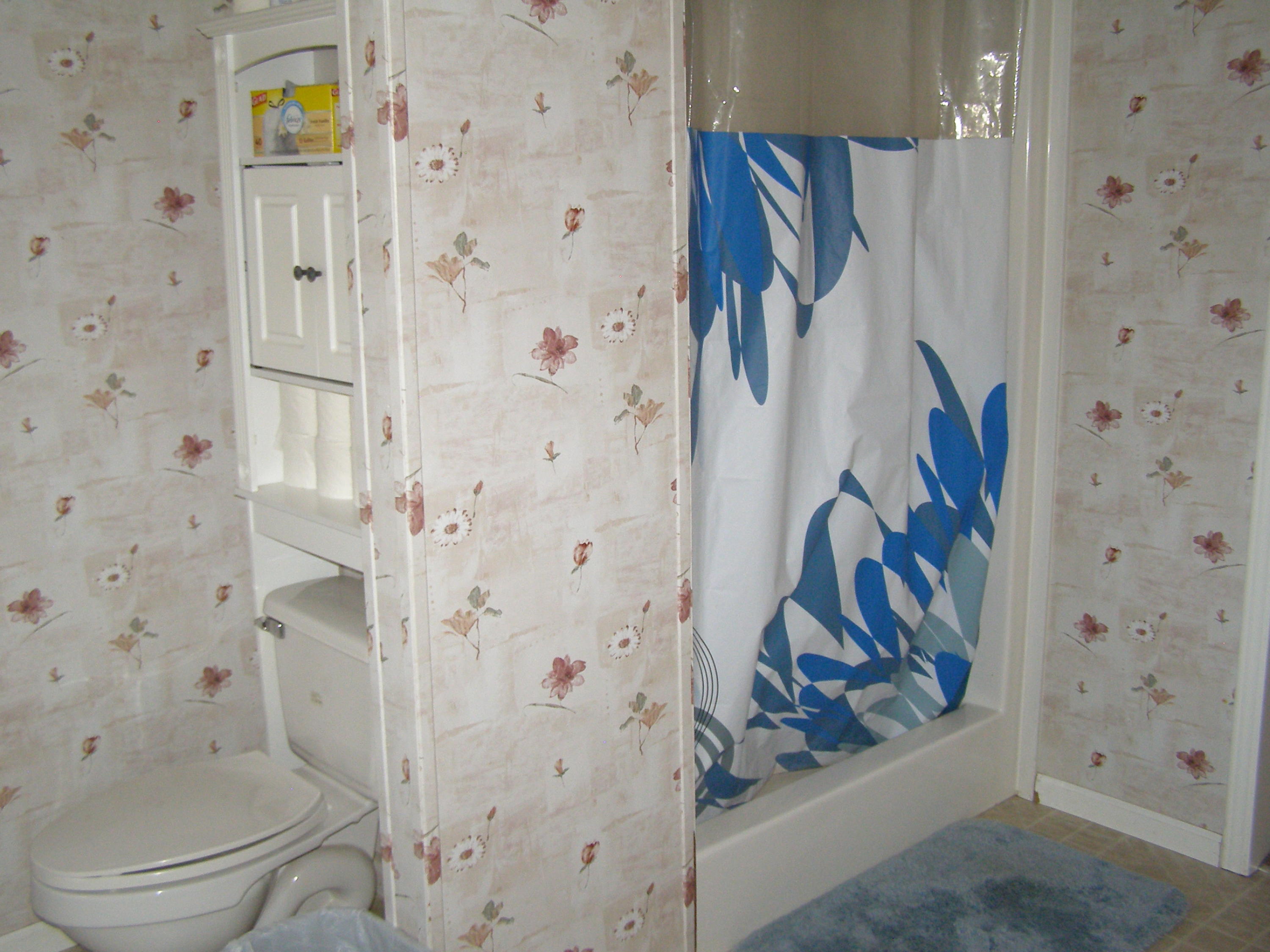 1121 State Line Road Baker, FL 32531 - Photo 17 of 25 view of a bathroom with a toilet and a shower