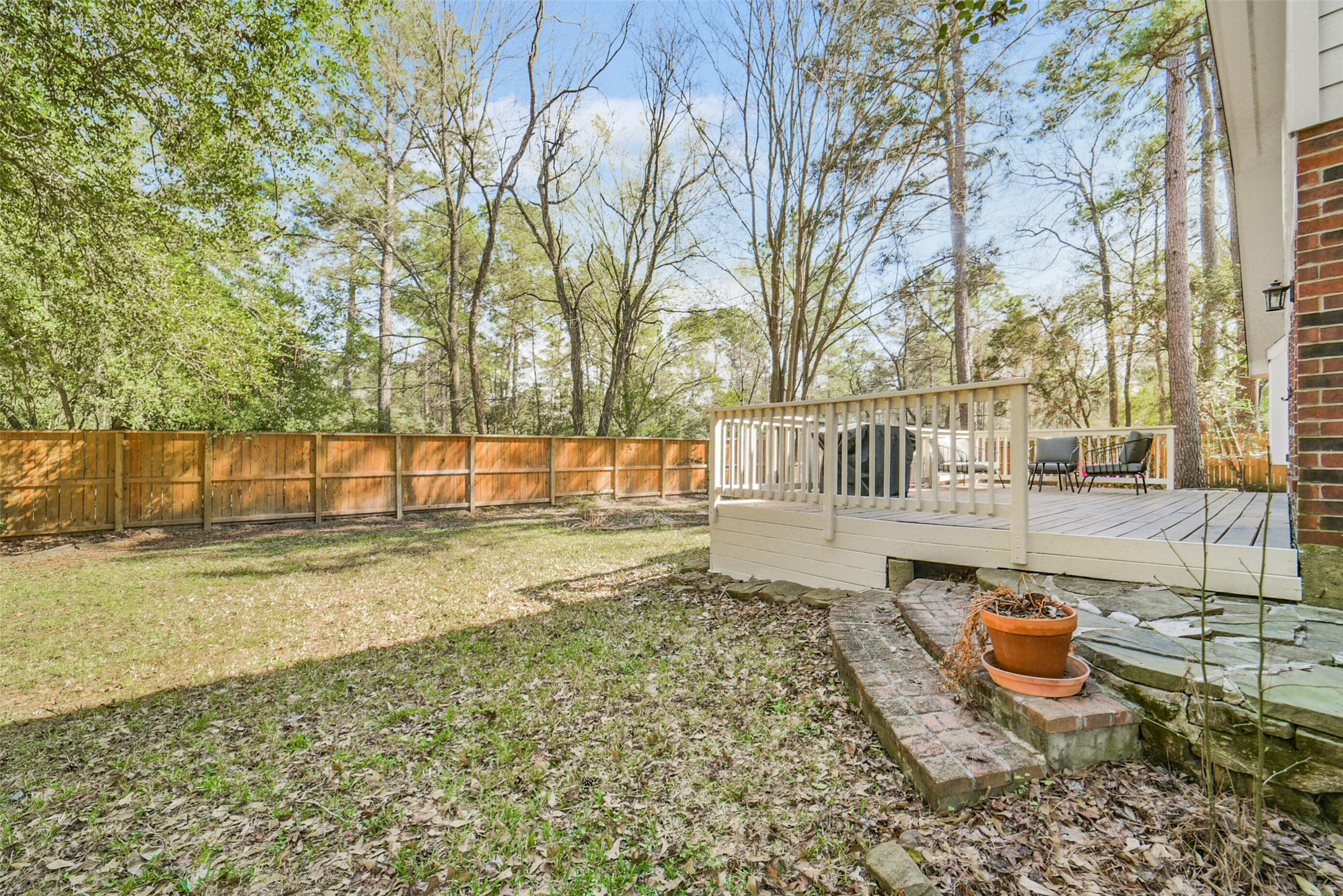 38 Tallow Hill Place Spring, TX 77382 - Photo 42 of 50 a view of a yard with wooden fence