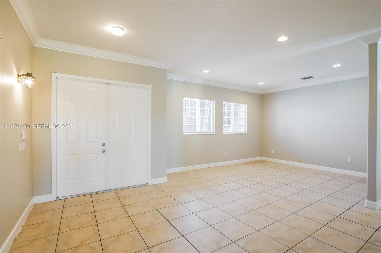 18686 Southwest 132nd Avenue Miami, FL 33177 - Photo 2 of 18 a view of an empty room and window