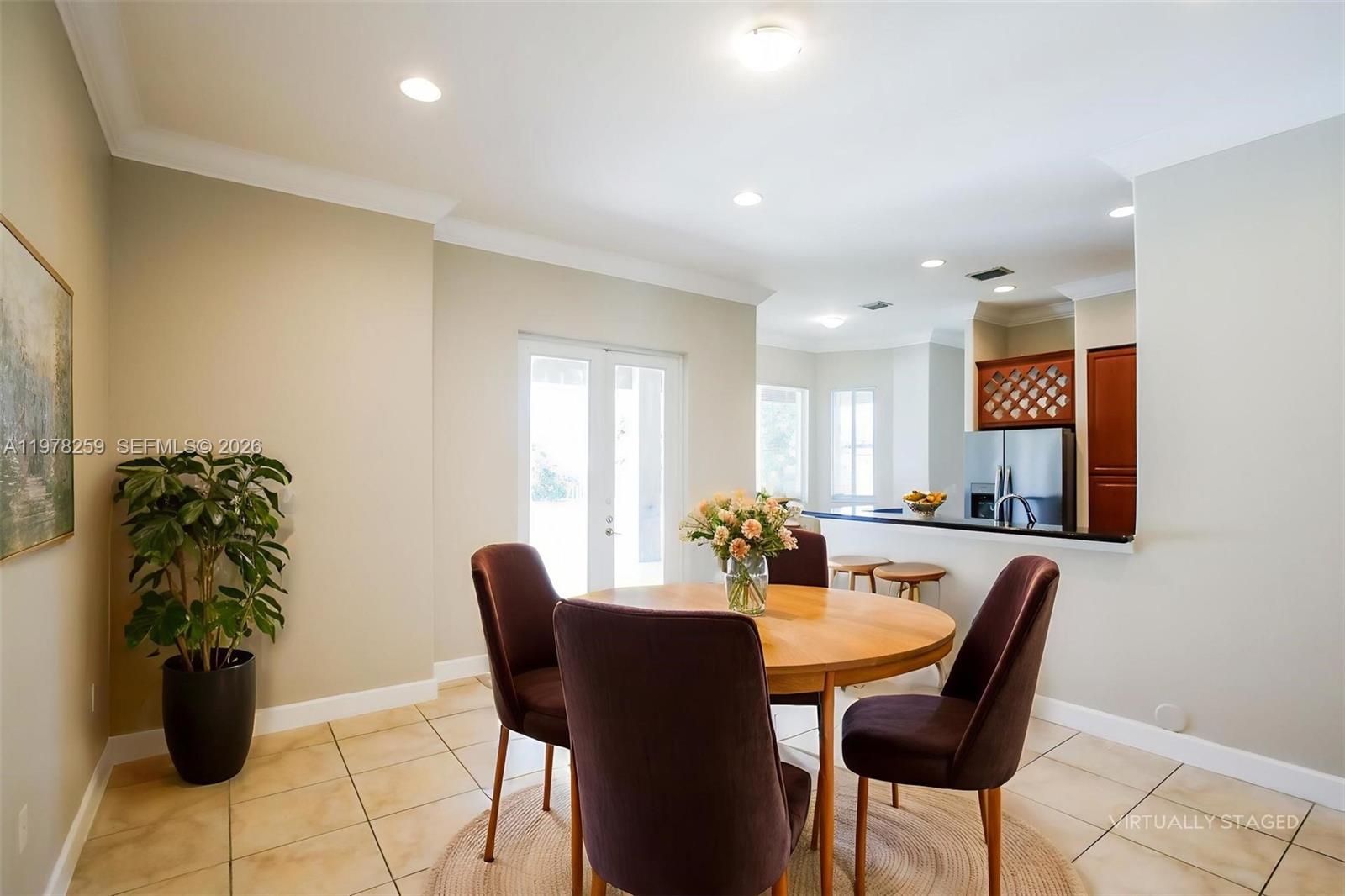 18686 Southwest 132nd Avenue Miami, FL 33177 - Photo 7 of 18 a view of a dining room with furniture
