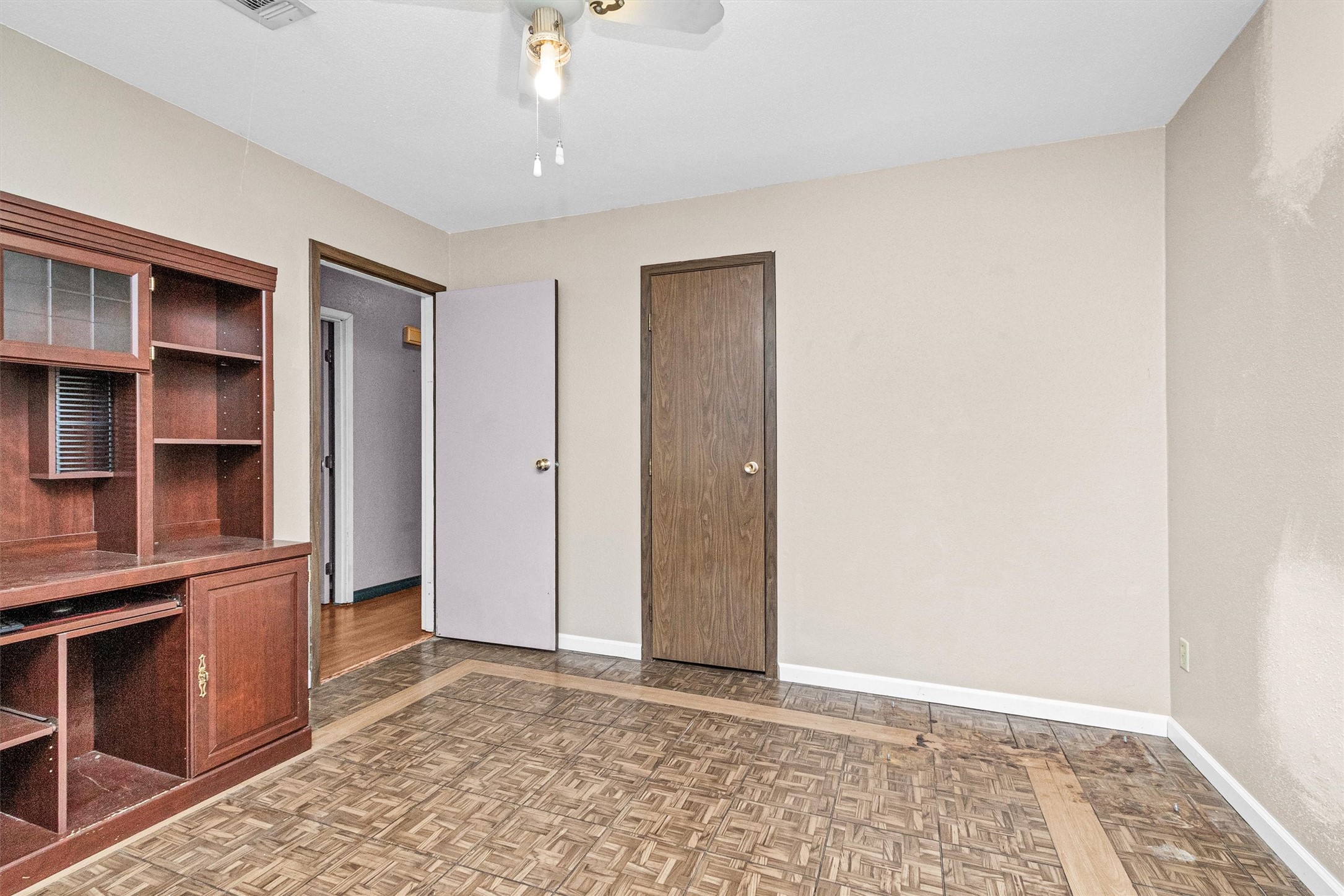 10067 White Rock Road Conroe, TX 77306 - Photo 33 of 46 a view of an empty room with window and cabinet