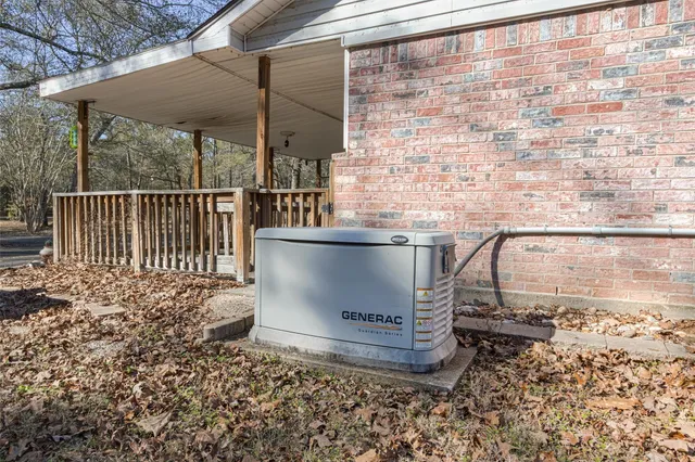 a view of a backyard with a small cabin