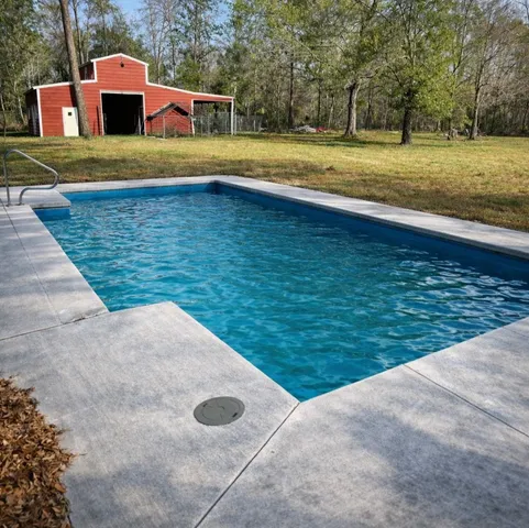 a view of swimming pool with outdoor space