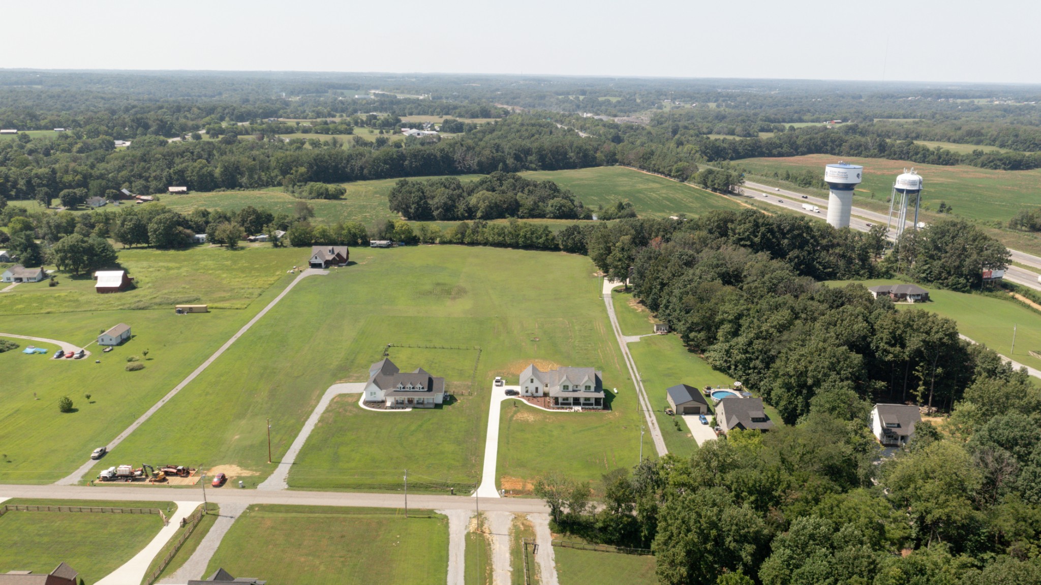 8935 Cedar Grove Road Cross Plains, TN 37049 - Photo 11 of 13 an aerial view of a tennis court