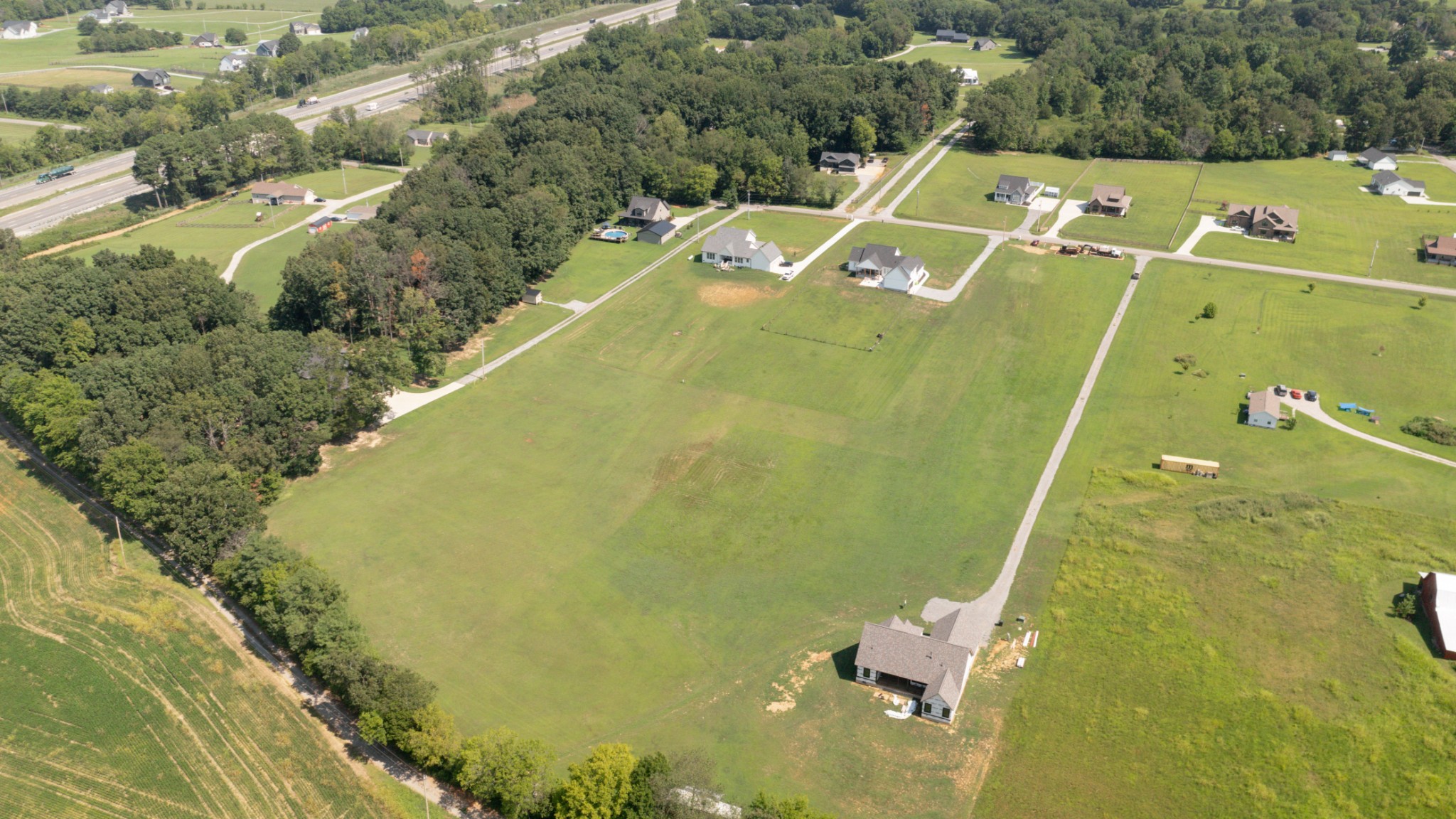 8935 Cedar Grove Road Cross Plains, TN 37049 - Photo 4 of 13 a view of a swimming pool with a yard