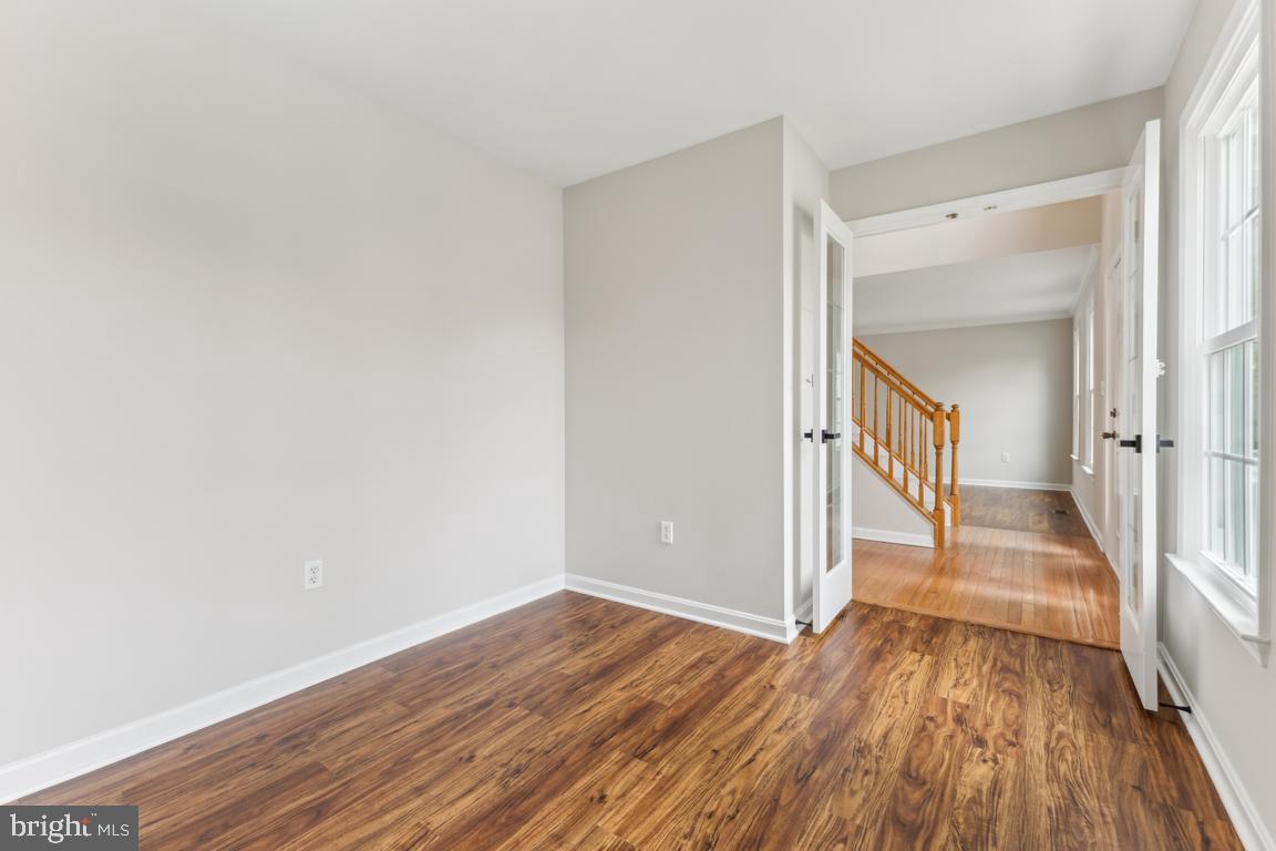 5 Basalt Drive Fredericksburg, VA 22406 - Photo 11 of 41 a view of a hallway with wooden floor and closet