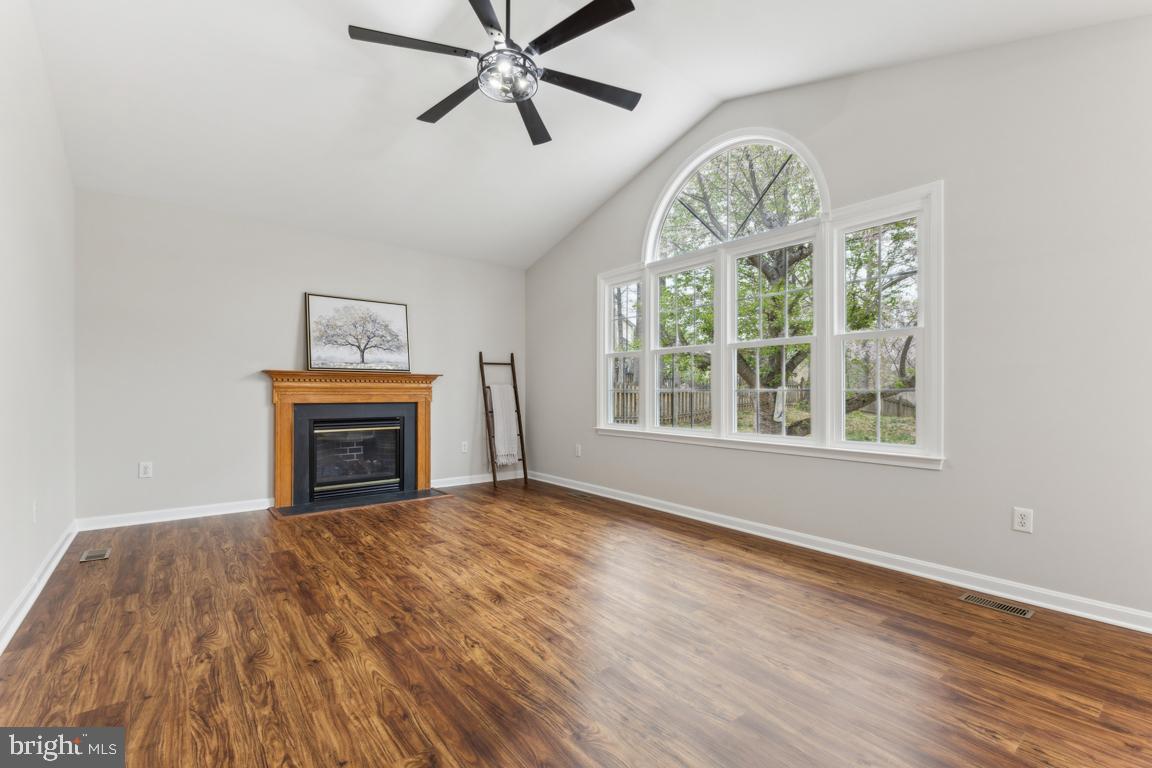 5 Basalt Drive Fredericksburg, VA 22406 - Photo 15 of 41 a view of an empty room with a window and wooden floor