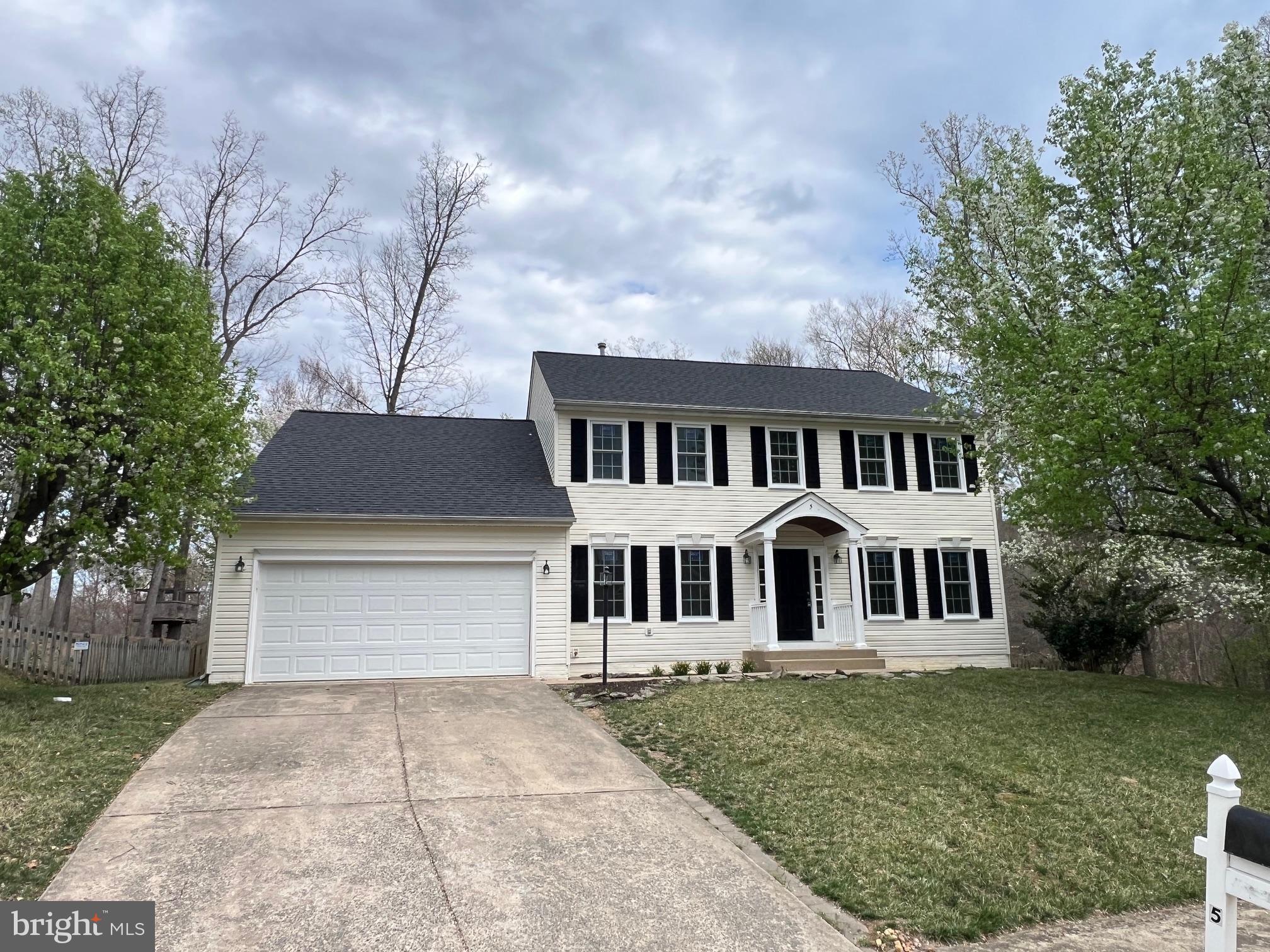 5 Basalt Drive Fredericksburg, VA 22406 - Photo 2 of 41 a front view of a house with garden
