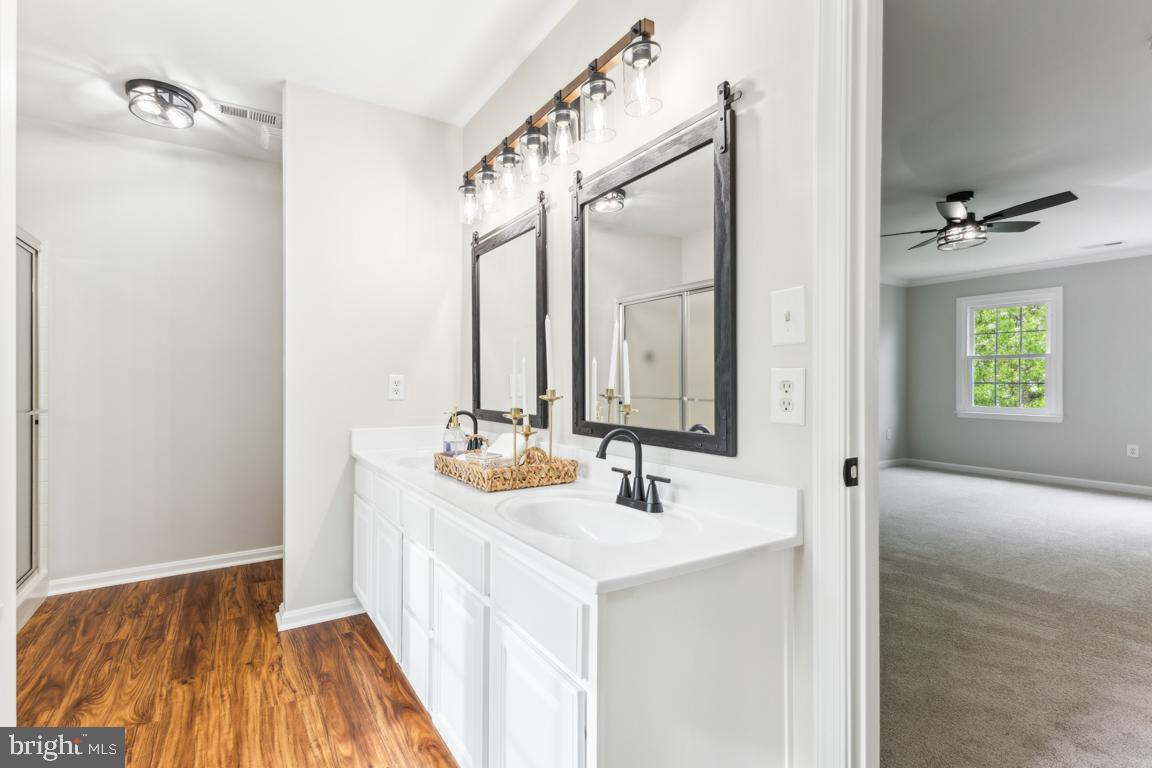 5 Basalt Drive Fredericksburg, VA 22406 - Photo 31 of 41 a bathroom with a sink and a mirror