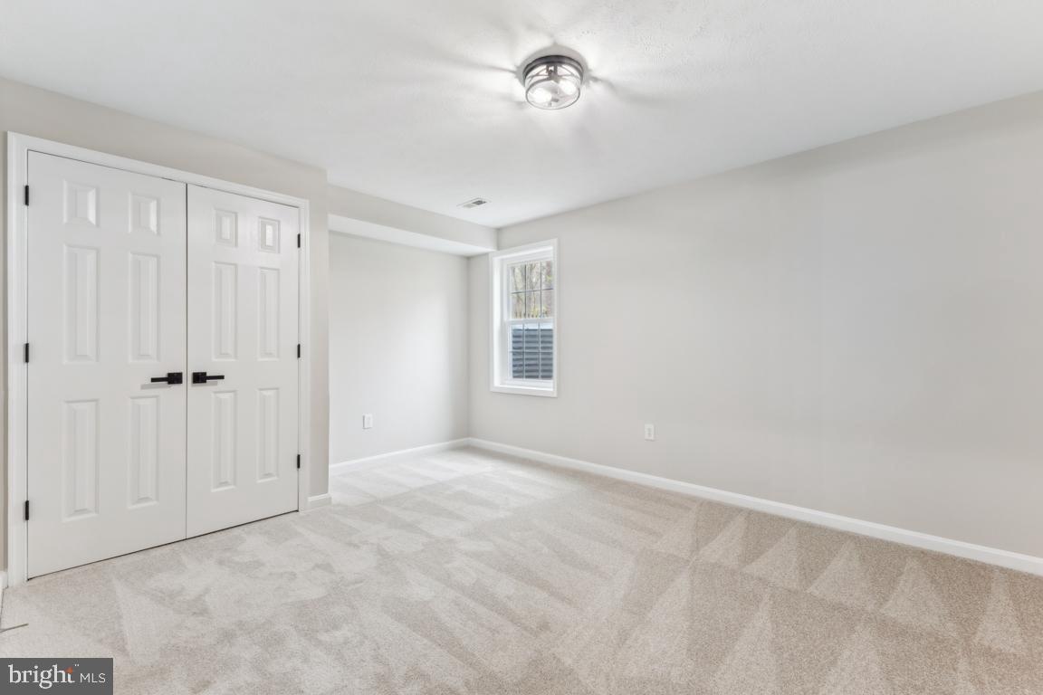 5 Basalt Drive Fredericksburg, VA 22406 - Photo 32 of 41 a view of an empty room with a window