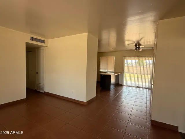 a view of a kitchen with a sink and dishwasher