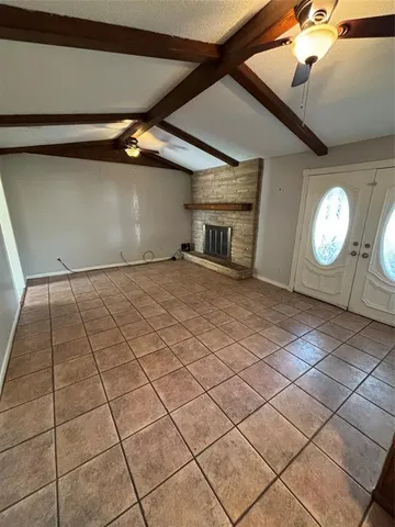 a view of a livingroom with wooden floor