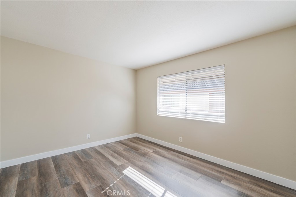 2155 Canyon Drive, Unit D Costa Mesa, CA 92627 - Photo 14 of 27 an empty room with a window