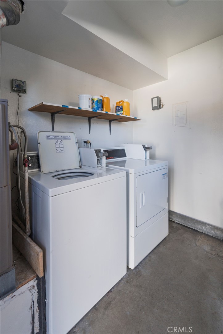 2155 Canyon Drive, Unit D Costa Mesa, CA 92627 - Photo 23 of 27 a utility room with dryer and washer