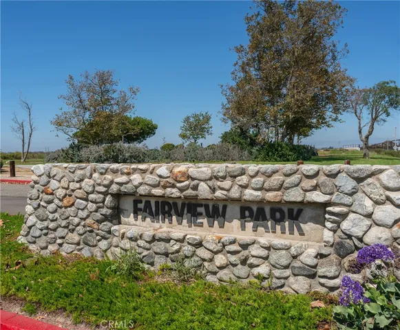 a view of a bench in the backyard