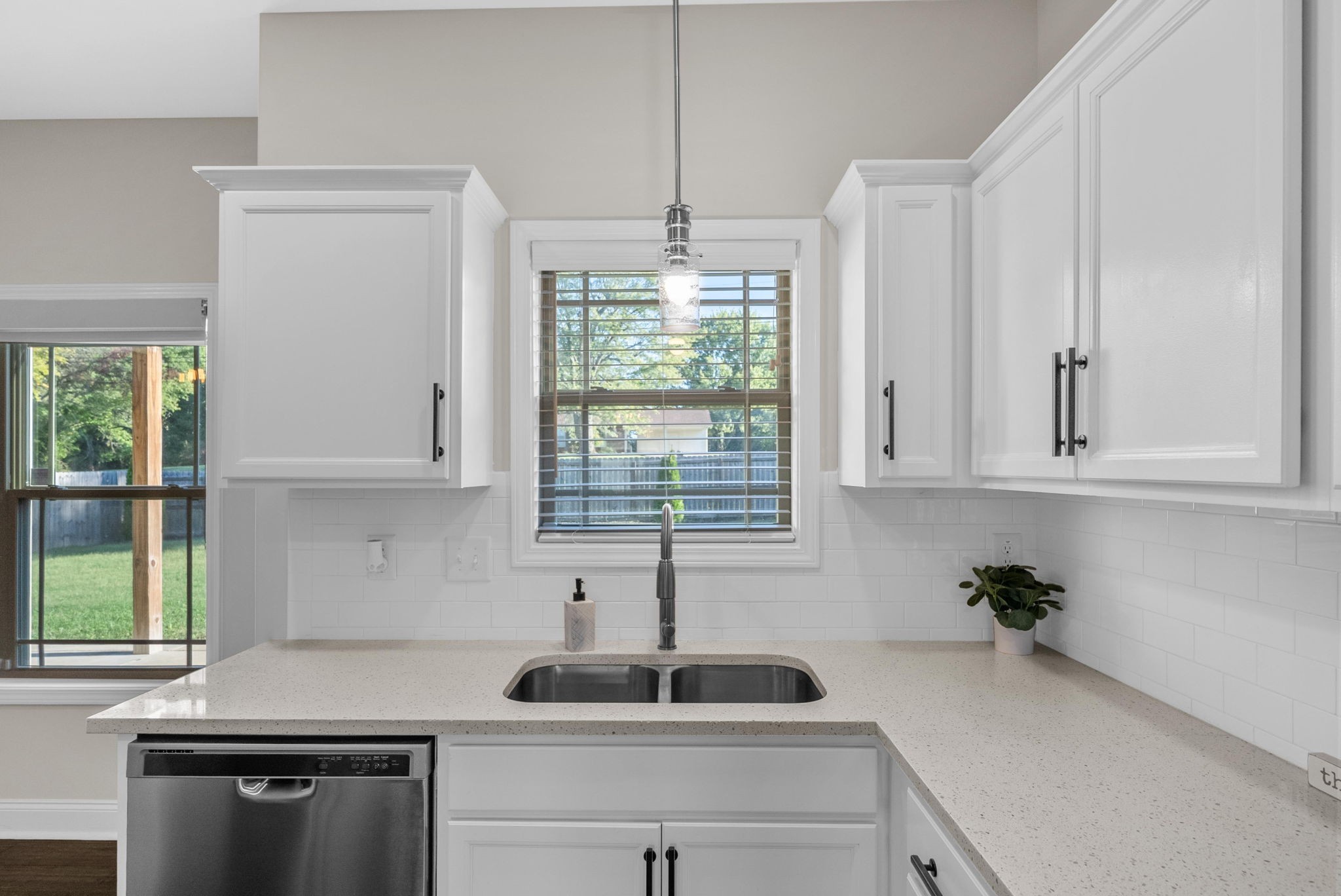 1197 Ewing Way Clarksville, TN 37043 - Photo 11 of 45 a kitchen with stainless steel appliances a sink a window and cabinets