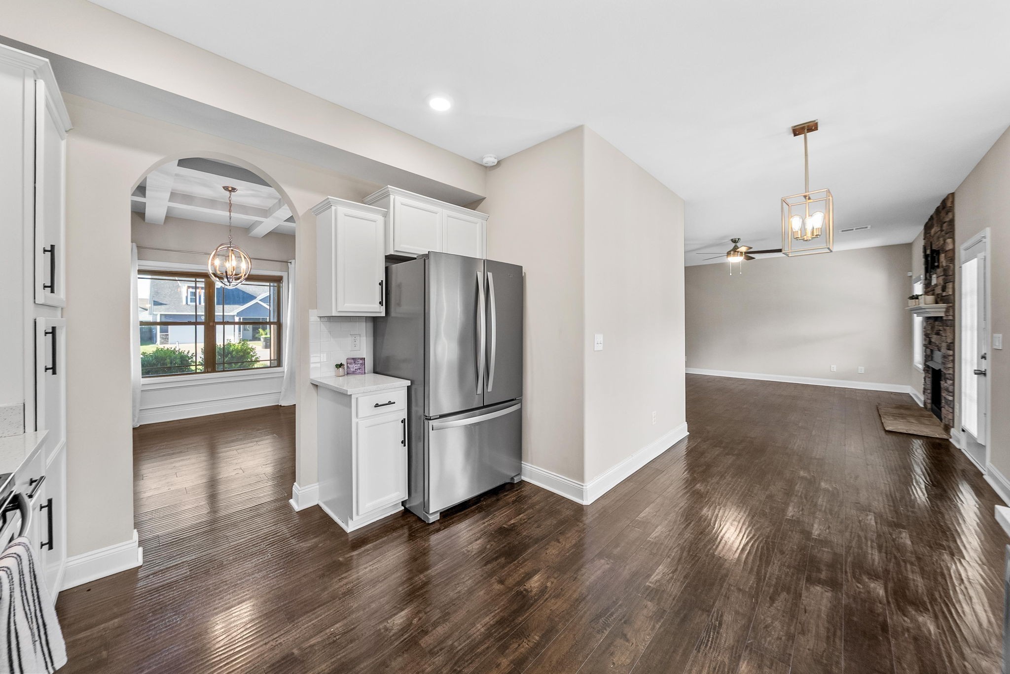 1197 Ewing Way Clarksville, TN 37043 - Photo 12 of 45 a view of a kitchen with refrigerator and wooden floor
