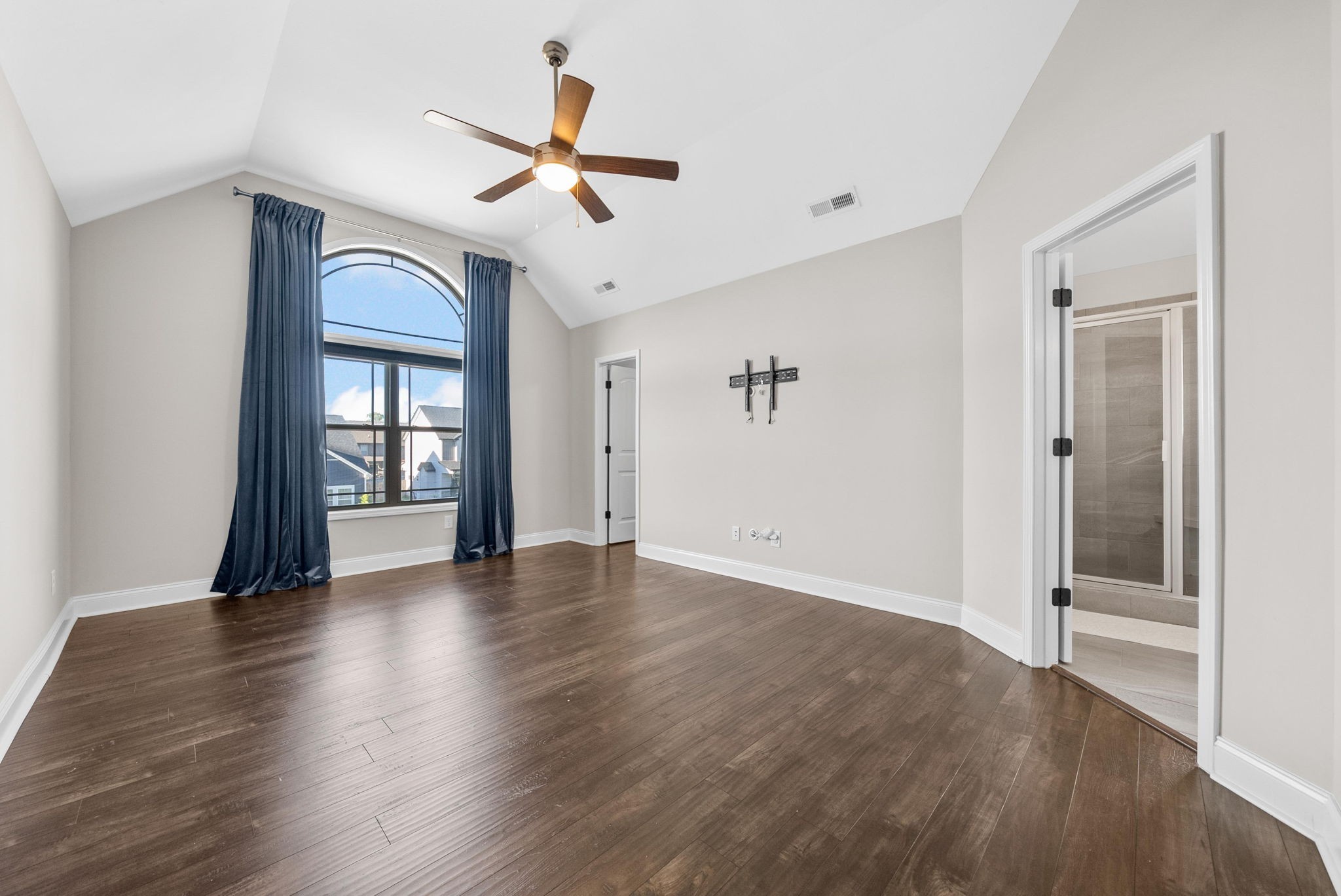1197 Ewing Way Clarksville, TN 37043 - Photo 22 of 45 a view of an empty room with window and wooden floor