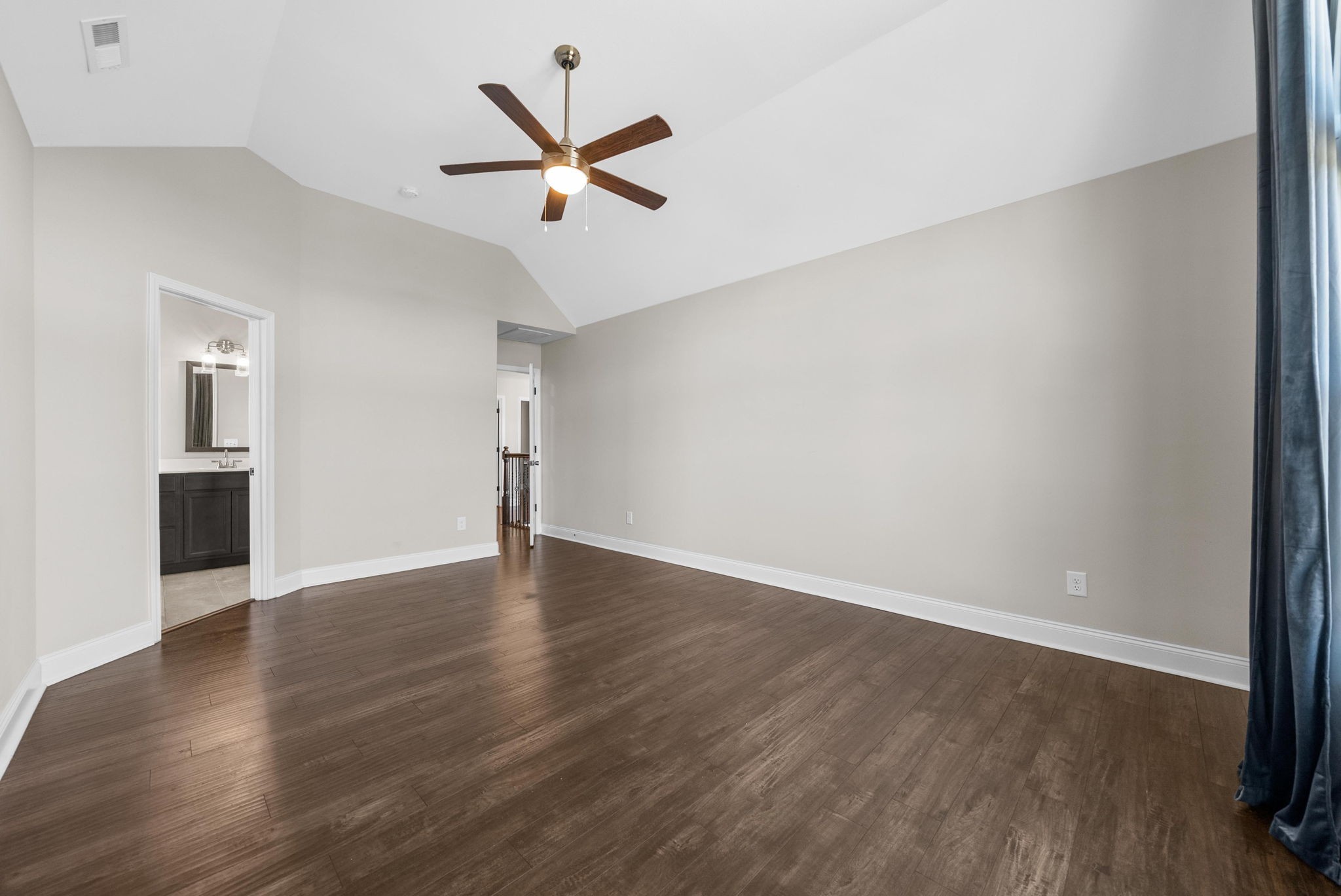 1197 Ewing Way Clarksville, TN 37043 - Photo 23 of 45 an empty room with wooden floor and windows