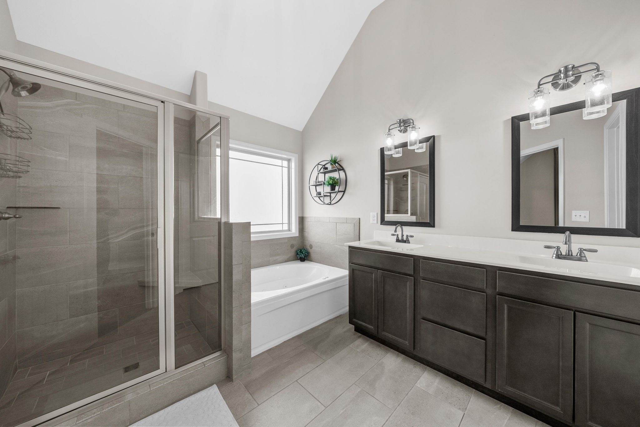 1197 Ewing Way Clarksville, TN 37043 - Photo 25 of 45 a bathroom with double vanity sinks and a mirror