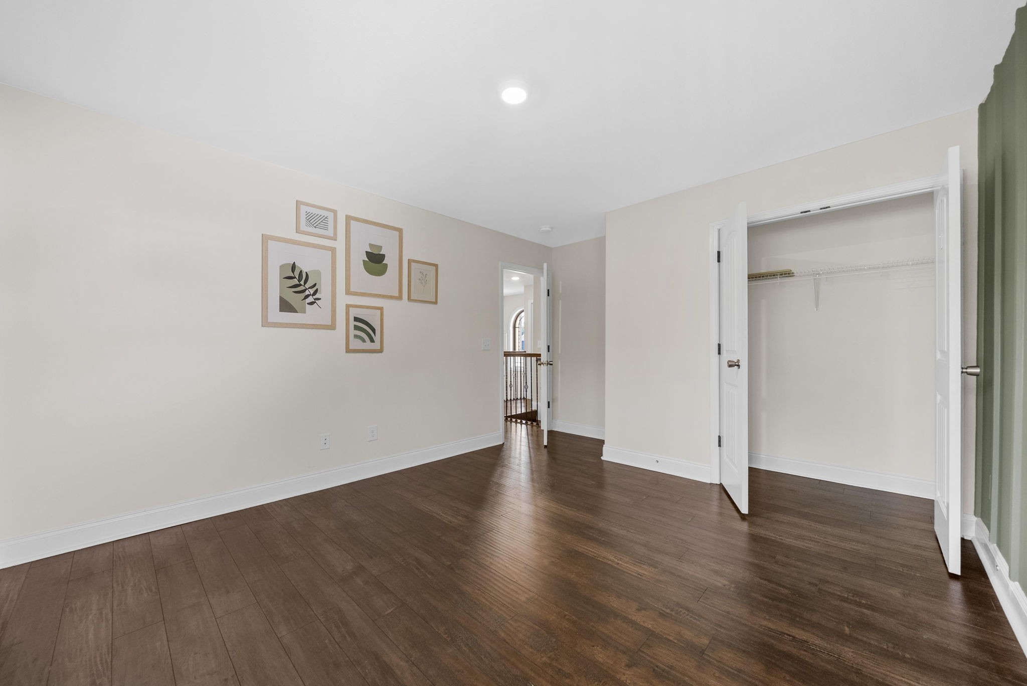 1197 Ewing Way Clarksville, TN 37043 - Photo 30 of 45 a view of an empty room with wooden floor and a window