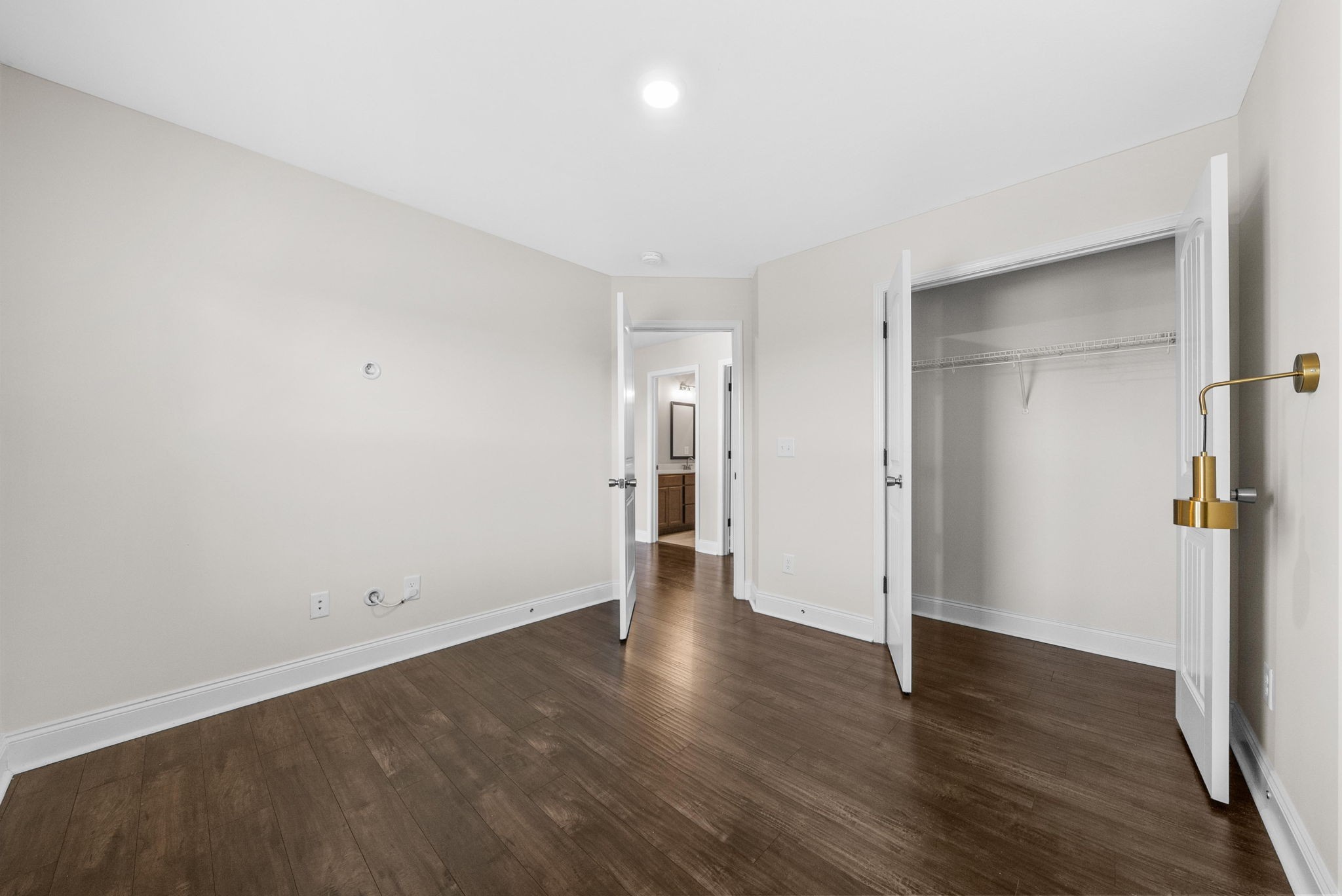 1197 Ewing Way Clarksville, TN 37043 - Photo 37 of 45 an empty room with wooden floor and windows
