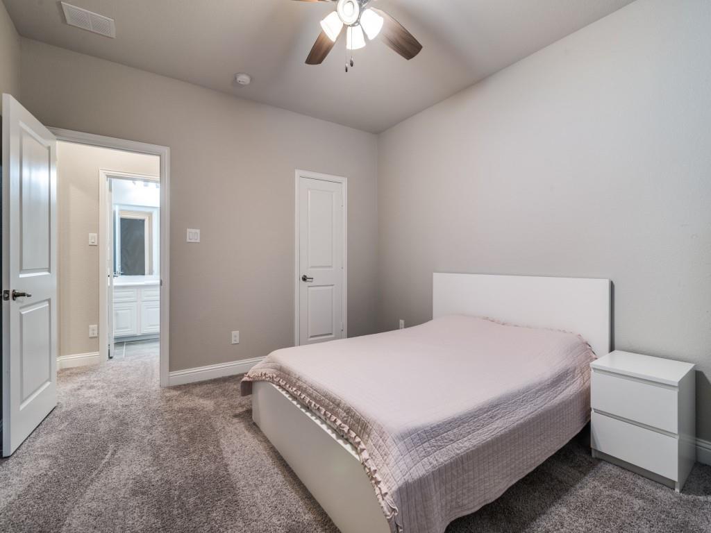 3323 Royal Ridge Drive Rockwall, TX 75087 - Photo 25 of 40 Carpeted bedroom 4 second level with a ceiling fan