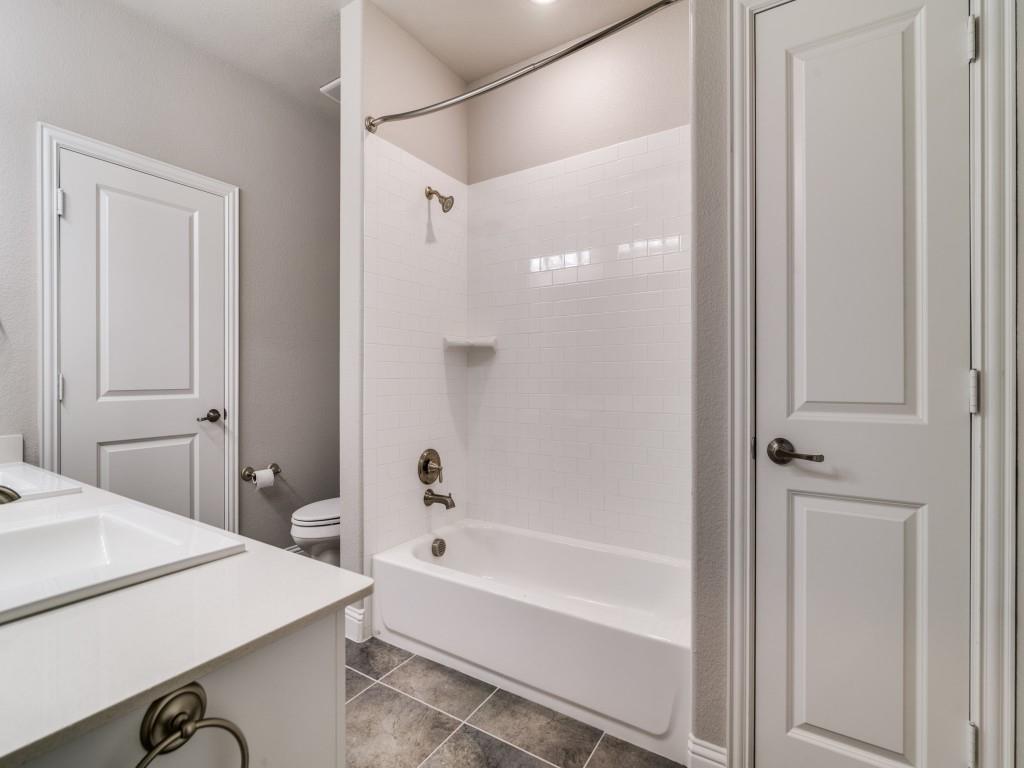 3323 Royal Ridge Drive Rockwall, TX 75087 - Photo 31 of 40 2nd level Full bath #3 featuring vanity, shower / bathtub combination, and tile patterned floors